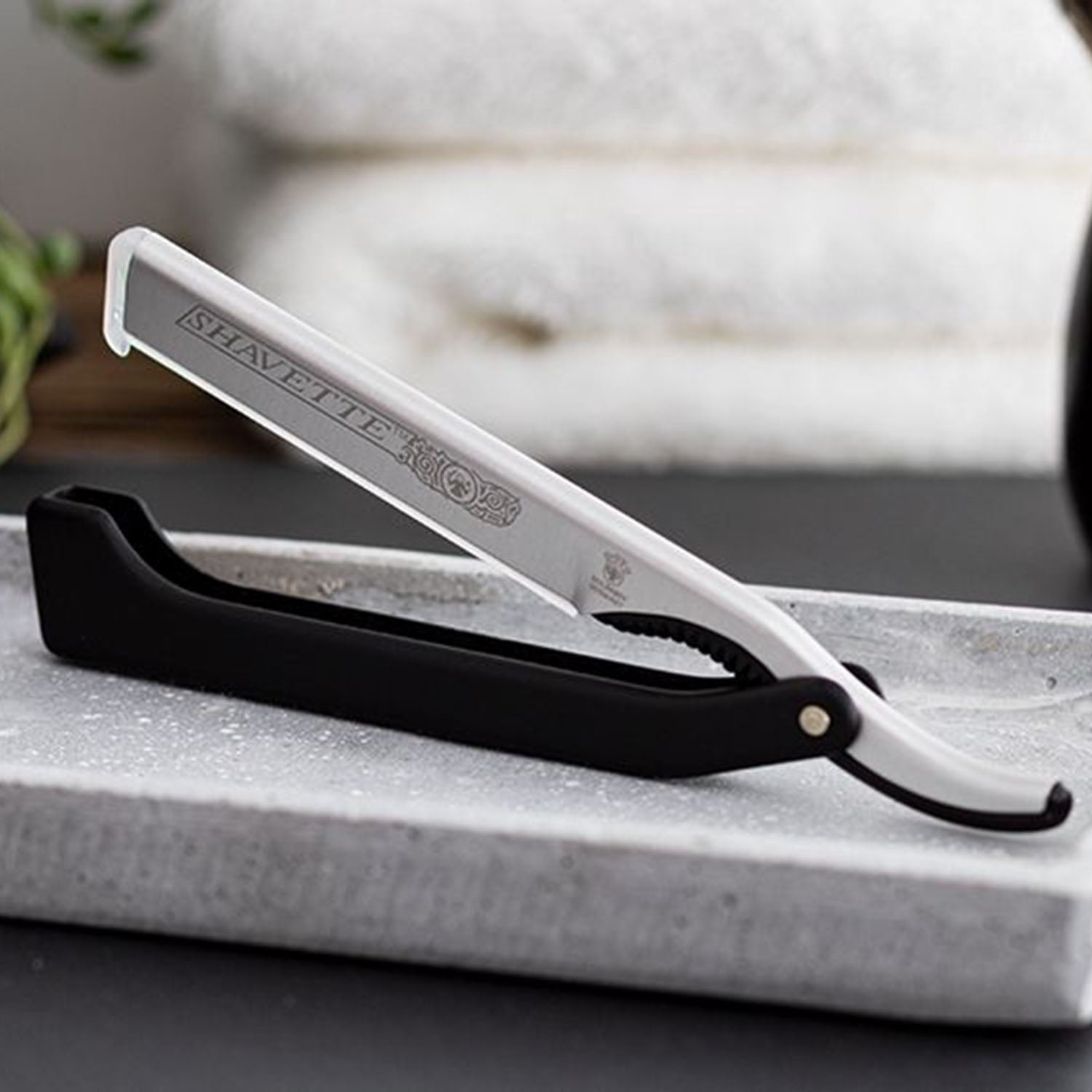 DOVO Shavette With Black Resin Handle.