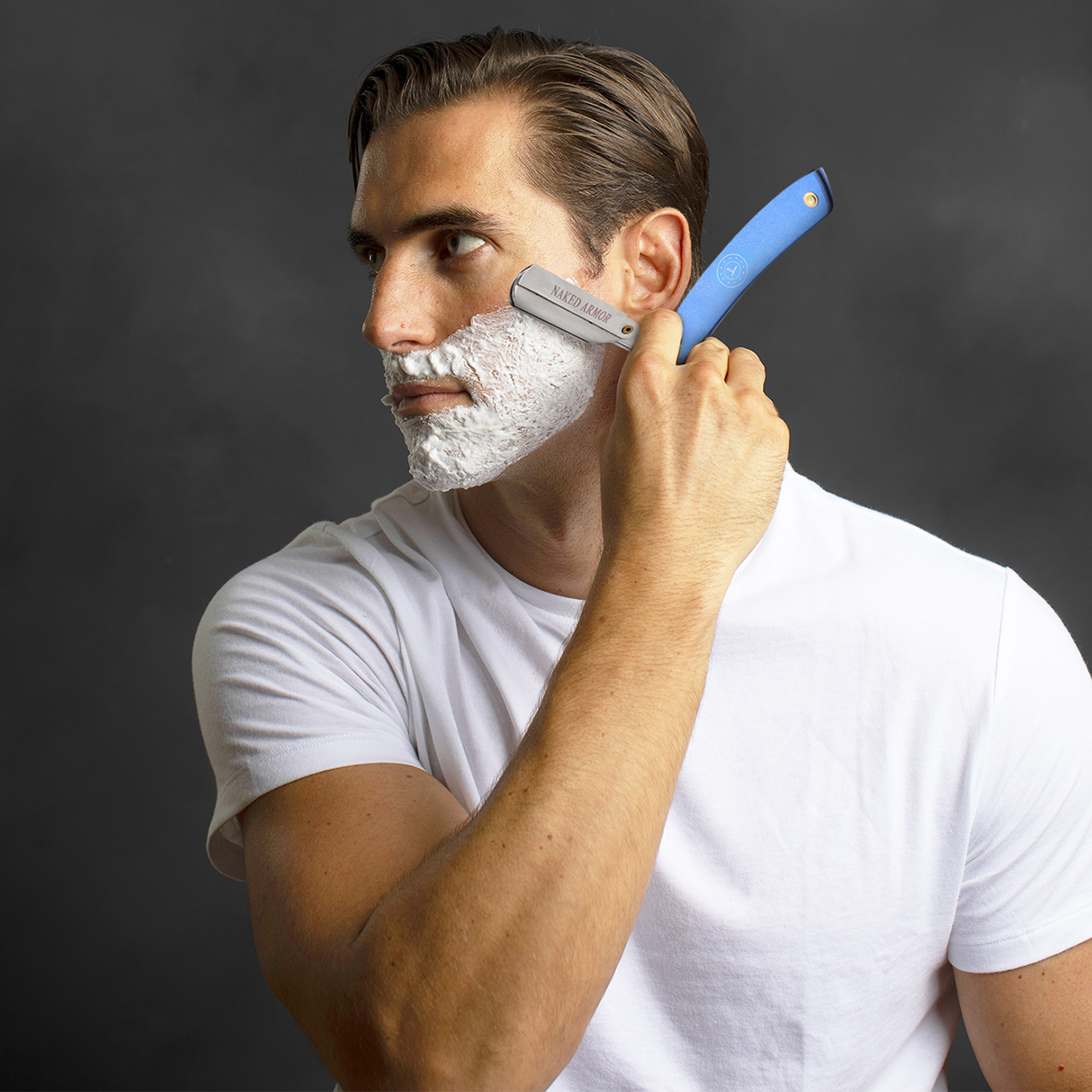 Naked Armor Shavette Titanium With Blue Handle.